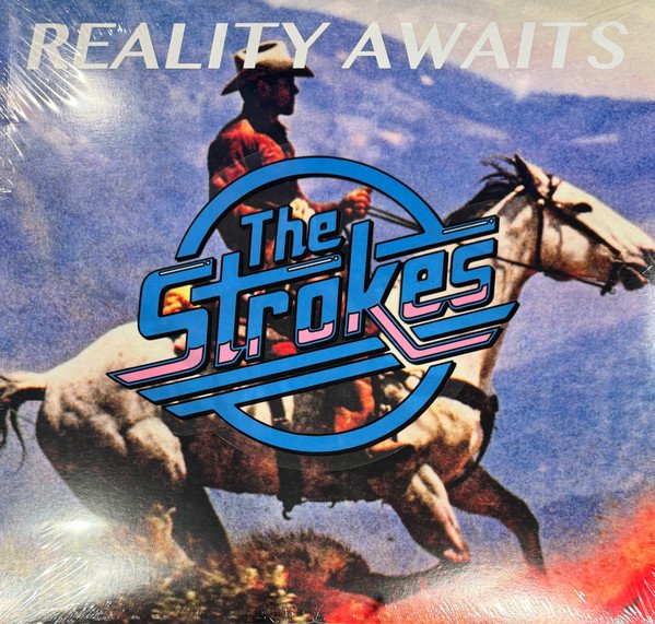 THE STROKES - REALITY AWAITS